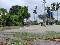 Houses are being seen as the Teesta River water enters Laltong forest village due to heavy and continuous rainfall in the area. The village...