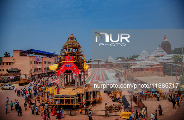 Wooden chariots are being constructed on the outskirts of the Shree Jagannath Temple ahead of the Lord Jagannath's annual chariot festival '...