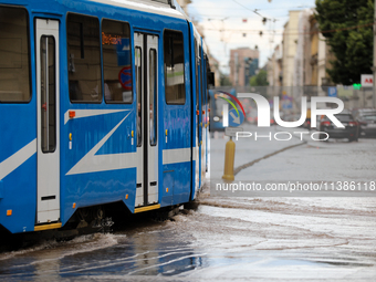 Flooding is occurring due to a water mains failure near the former Main Post Office in Krakow, Poland, on July 4, 2024. (