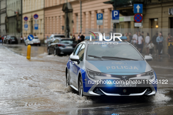 Police are responding to flooding due to a water mains failure at the former Main Post Office in Krakow, Poland, on July 4, 2024. 