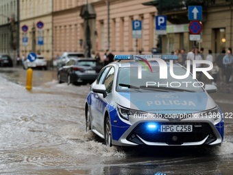 Police are responding to flooding due to a water mains failure at the former Main Post Office in Krakow, Poland, on July 4, 2024. (