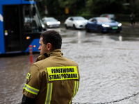 The fire brigade is responding to flooding due to a water mains failure near the former Main Post Office in Krakow, Poland, on July 4, 2024....