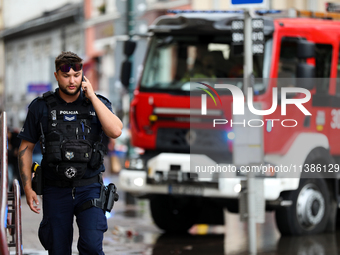 Police are responding to flooding due to a water mains failure at the former Main Post Office in Krakow, Poland, on July 4, 2024. (