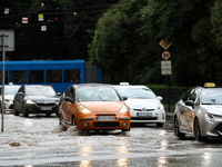 Flooding is occurring due to a water mains failure near the former Main Post Office in Krakow, Poland, on July 4, 2024. (