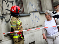 The fire brigade is responding to flooding due to a water mains failure near the former Main Post Office in Krakow, Poland, on July 4, 2024....