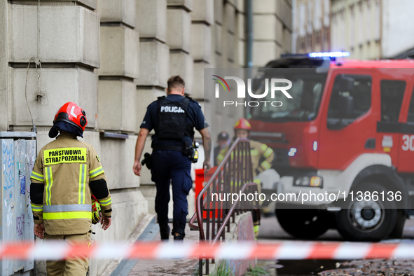 The fire brigade is responding to flooding due to a water mains failure near the former Main Post Office in Krakow, Poland, on July 4, 2024....