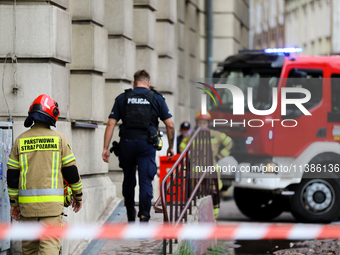 The fire brigade is responding to flooding due to a water mains failure near the former Main Post Office in Krakow, Poland, on July 4, 2024....