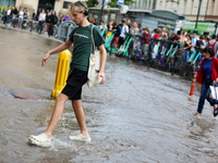 Flooding is occurring due to a water mains failure near the former Main Post Office in Krakow, Poland, on July 4, 2024. (