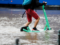 Flooding is occurring due to a water mains failure near the former Main Post Office in Krakow, Poland, on July 4, 2024. (