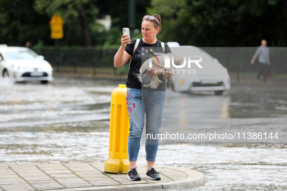 Flooding is occurring due to a water mains failure near the former Main Post Office in Krakow, Poland, on July 4, 2024. 