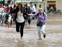 Flooding is occurring due to a water mains failure near the former Main Post Office in Krakow, Poland, on July 4, 2024. (