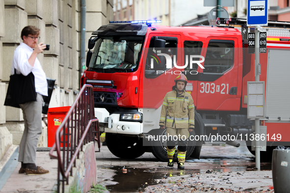 The fire brigade is responding to flooding due to a water mains failure near the former Main Post Office in Krakow, Poland, on July 4, 2024....