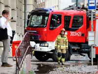 The fire brigade is responding to flooding due to a water mains failure near the former Main Post Office in Krakow, Poland, on July 4, 2024....