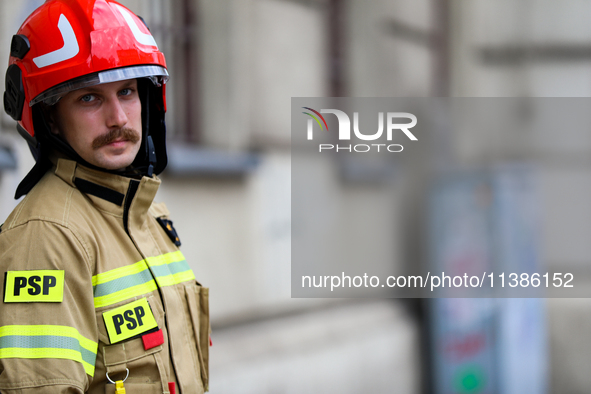 The fire brigade is responding to flooding due to a water mains failure near the former Main Post Office in Krakow, Poland, on July 4, 2024....