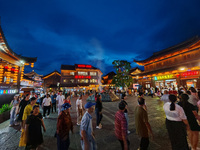 Tourists are enjoying Tea Horse Ancient City in Pu'er, Yunnan province, China, on July 1, 2024. (