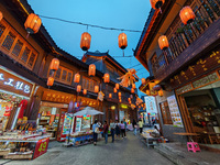 Tourists are enjoying Tea Horse Ancient City in Pu'er, Yunnan province, China, on July 1, 2024. (