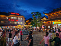 Tourists are enjoying Tea Horse Ancient City in Pu'er, Yunnan province, China, on July 1, 2024. (