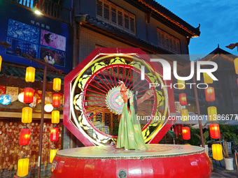 Tourists are enjoying Tea Horse Ancient City in Pu'er, Yunnan province, China, on July 1, 2024. (