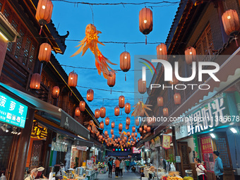 Tourists are enjoying Tea Horse Ancient City in Pu'er, Yunnan province, China, on July 1, 2024. (