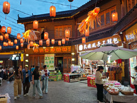 Tourists are enjoying Tea Horse Ancient City in Pu'er, Yunnan province, China, on July 1, 2024. (