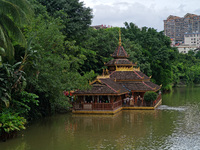 Tourists are enjoying the scenery in the Manting Imperial Garden in Xishuangbanna, China, on July 3, 2024. (