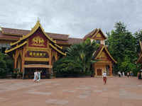 Tourists are enjoying the scenery in the Manting Imperial Garden in Xishuangbanna, China, on July 3, 2024. (