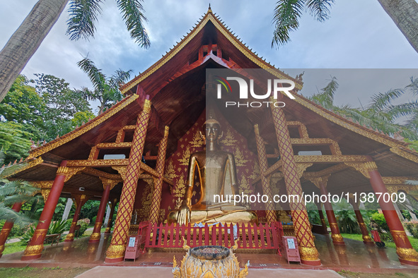 The General Buddhist Temple is standing in Xishuangbanna, China, on July 3, 2024. 