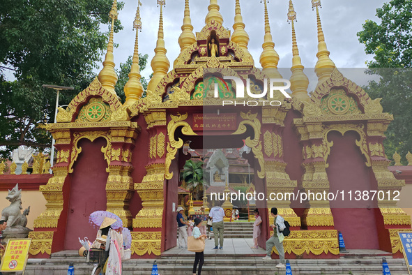 The General Buddhist Temple is standing in Xishuangbanna, China, on July 3, 2024. 