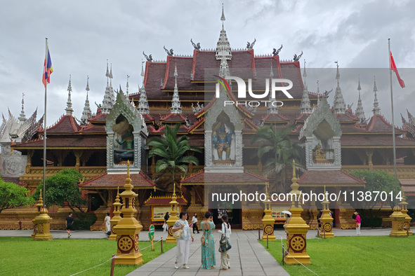 The General Buddhist Temple is standing in Xishuangbanna, China, on July 3, 2024. 