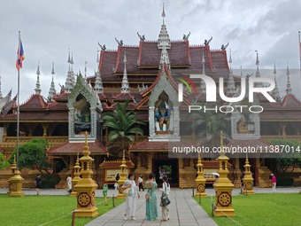 The General Buddhist Temple is standing in Xishuangbanna, China, on July 3, 2024. (