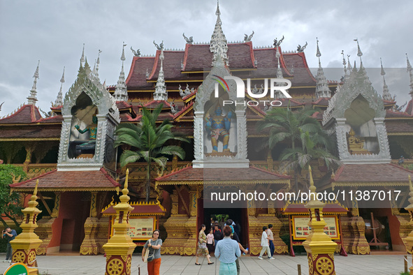 The General Buddhist Temple is standing in Xishuangbanna, China, on July 3, 2024. 