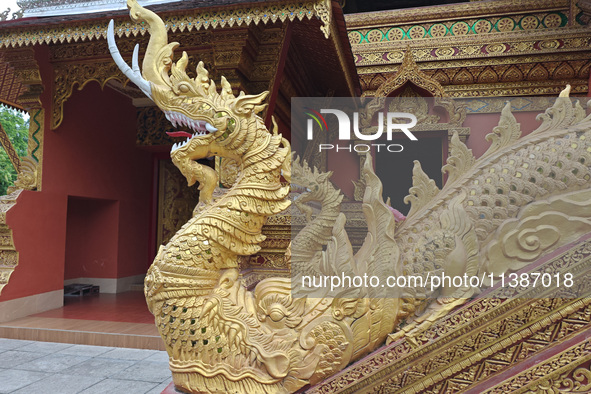 The General Buddhist Temple is standing in Xishuangbanna, China, on July 3, 2024. 