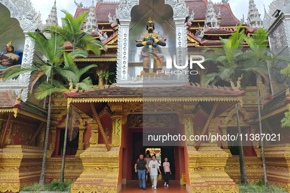 The General Buddhist Temple is standing in Xishuangbanna, China, on July 3, 2024. 