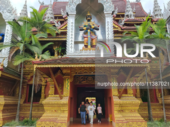 The General Buddhist Temple is standing in Xishuangbanna, China, on July 3, 2024. (