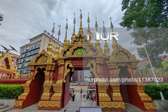 The General Buddhist Temple is standing in Xishuangbanna, China, on July 3, 2024. 