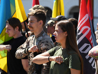 People are shouting slogans during a funeral ceremony for British volunteer and combat medic Peter Fouche at Independence Square in Kyiv, Uk...