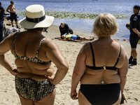 Rescuers are conducting a drowning exercise at a beach on the banks of the Dnipro River in Kyiv, Ukraine, on July 06, 2024 (