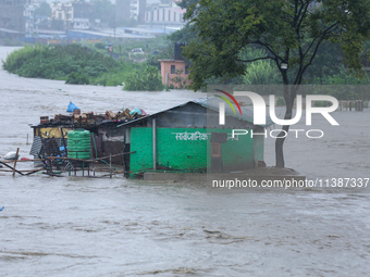 A public toilet is being partially submerged in Kathmandu, Nepal, on July 6, 2024 (