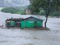 A public toilet is being partially submerged in Kathmandu, Nepal, on July 6, 2024 (