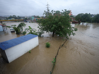 Flooding is submerging a section of road in Kathmandu, Nepal, on July 6, 2024. (