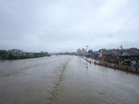 Flooding is submerging a section of road in Kathmandu, Nepal, on July 6, 2024. (