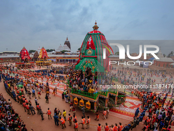 Newly Built Wooden Chariots Of Lord Balabhadra, Devi Subhadra And Lord Jagannath Are Seen In Front Of The Shree Jagannath Temple On The Eve...