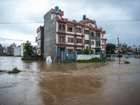 The road in Tikathali, Kathmandu, is flooding after incessant rainfall in Kathmandu, Nepal, on July 06, 2024. (