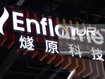 The logo of ''Englame,'' a Shanghai startup software company, is being seen at the World Artificial Intelligence Conference at the Shanghai...