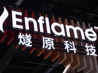 The logo of ''Englame,'' a Shanghai startup software company, is being seen at the World Artificial Intelligence Conference at the Shanghai...