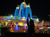 Many devotees are offering prayers at the Jagannath Temple on the eve of Lord Jagannath's 147th Rath Yatra in Ahmedabad, India, on Saturday....