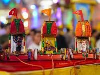 Many devotees are offering prayers at the Jagannath Temple on the eve of Lord Jagannath's 147th Rath Yatra in Ahmedabad, India, on Saturday....