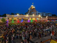 Many devotees are offering prayers at the Jagannath Temple on the eve of Lord Jagannath's 147th Rath Yatra in Ahmedabad, India, on Saturday....