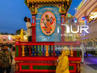 Many devotees are offering prayers at the Jagannath Temple on the eve of Lord Jagannath's 147th Rath Yatra in Ahmedabad, India, on Saturday....