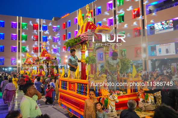 Many devotees are offering prayers at the Jagannath Temple on the eve of Lord Jagannath's 147th Rath Yatra in Ahmedabad, India, on Saturday....